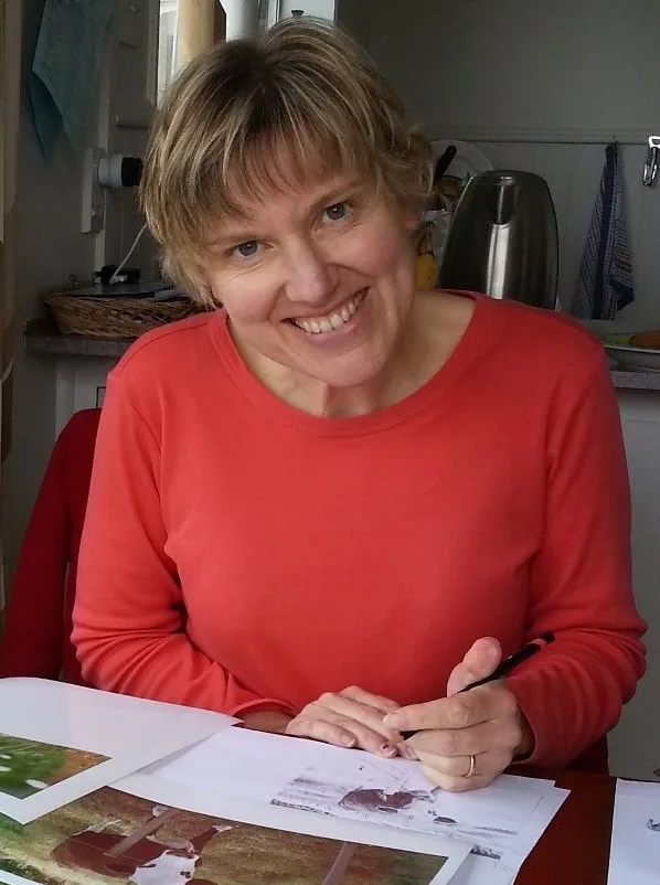 Fiona Goulding working on a sketch for a painting in her studio